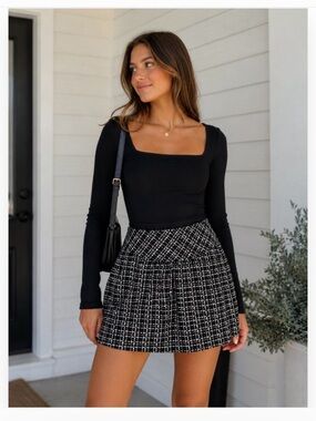 One A Black and White Plaid Pleated Mini Skirt